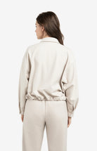 blouse-with-asymmetric-button-placket-and-elastic-hem_c6a567fc-f2bb-48f8-8d7c-4f44e5052eb8.jpg