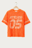 product_images-orange_lace_top_22atelier_05_22_mj15642-0300_front_on_hanger