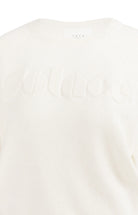 sweater-with-raglan-sleeves-and-tonal-artwork-1_8cfa11d1-beef-4278-951d-50b69f1b8b57.jpg